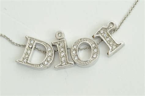 christian dior neclace|dior letters necklace value.